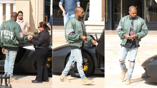 Here's Kanye West Leaving Barneys Wearing a Confederate Flag Jacket